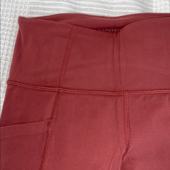 SOLD - Athleta Stash pocket salutation tight - Picture 2 of 10